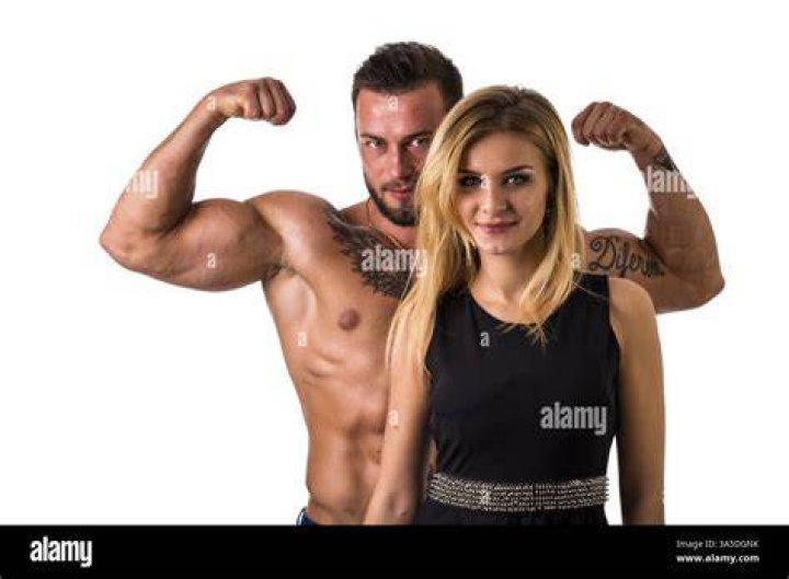 a man and woman posing for a picture
