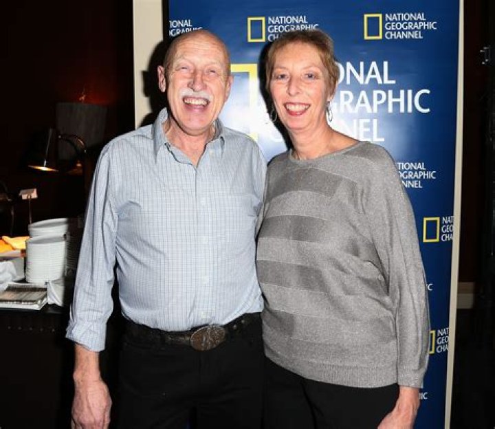 Dr. Jan Pol and his wife, Diane Pol, of 'The Incredible Dr. Pol' pose with fans
