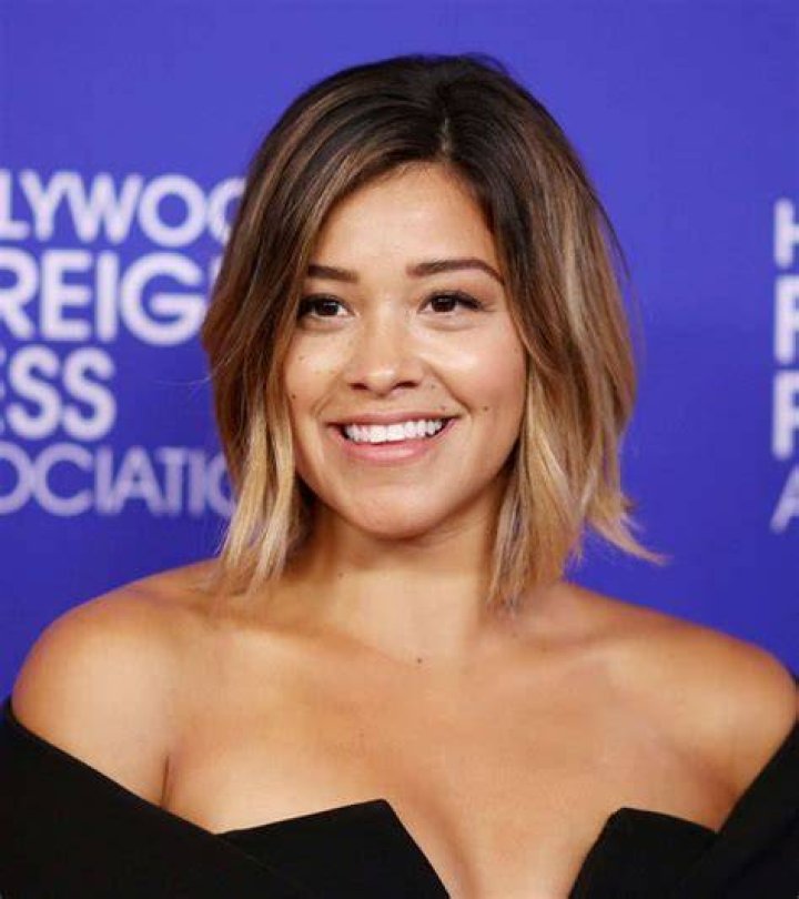 Gina Rodriguez Hollywood Foreign Press Red Carpet 2016 gina rodriguez new short blonde hair cut red carpet 2016