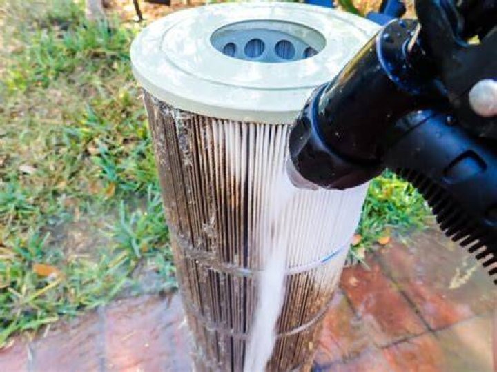 How do you clean a pool filter with bleach?