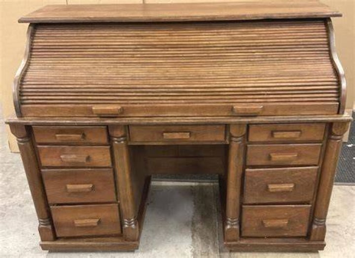 How do you move a roll top desk?