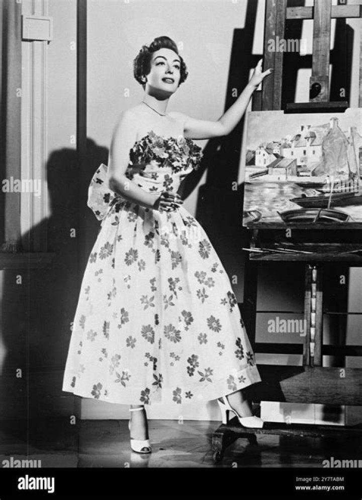 Joan-Crawford,-The-Bride-Wore-Red,-MGM-THE-KOBAL-COLLECTION-GEORGE-HURRELL <p>Joan Crawford wears a full length red bugle beaded evening gown in 'The Bride Wore Red', designed by Adrian.</p>