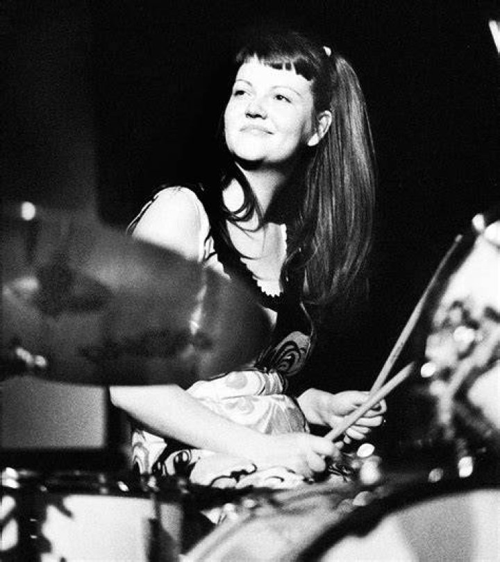 Meg White smiles behind a drumset meg white smiles behind a drumset