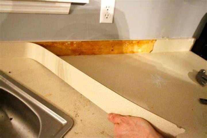 Question: How Do You Remove A Glued Kitchen Countertop??