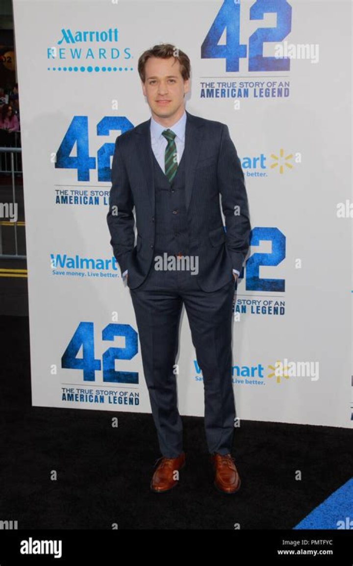 Theodore Raymond 'T.R.' Knight attending an ABC event while wearing a blue shirt and black blazer.